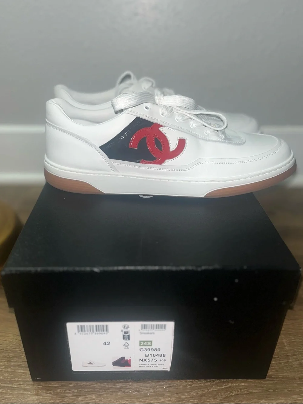 CHANEL White Leather Sneakers with Red CC and Black Panel